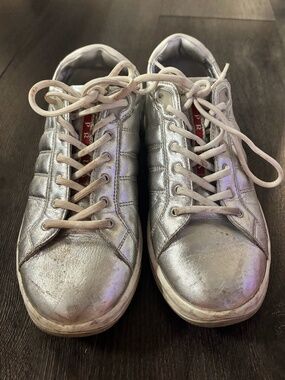 Prada Linea Rossa sneakers in metallic silver leather